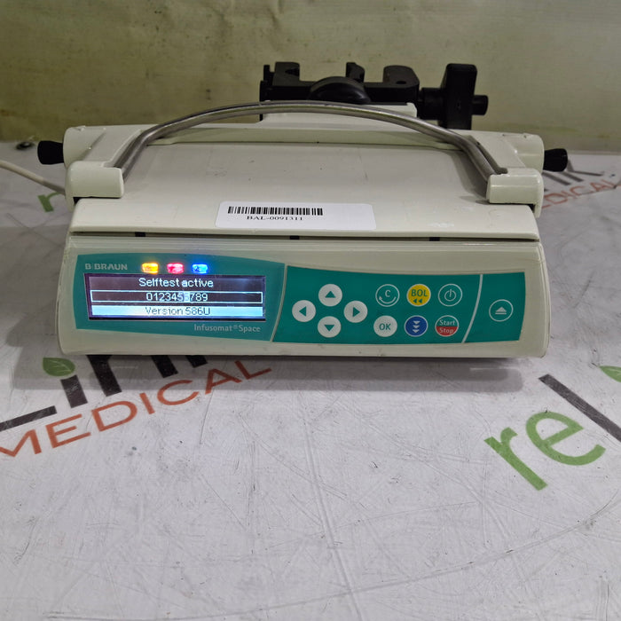 B. Braun Infusomat Space w/Pole Clamp & AC Adapter Infusion Pump