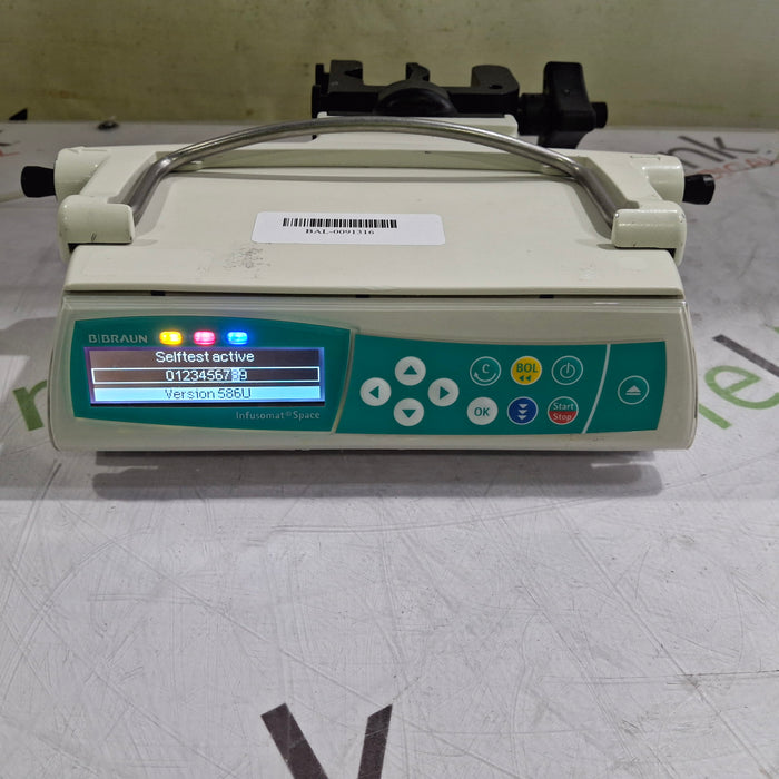 B. Braun Infusomat Space w/Pole Clamp & AC Adapter Infusion Pump