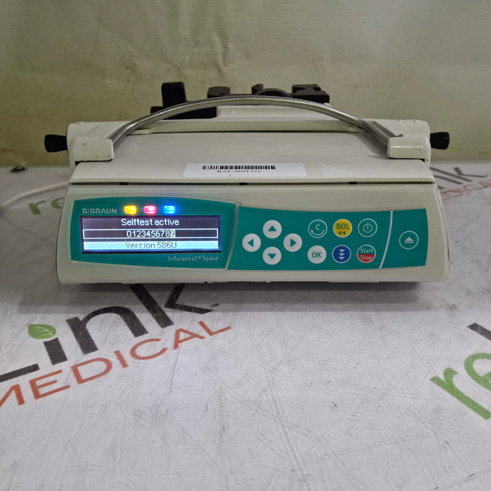 B. Braun Infusomat Space w/Pole Clamp & AC Adapter Infusion Pump