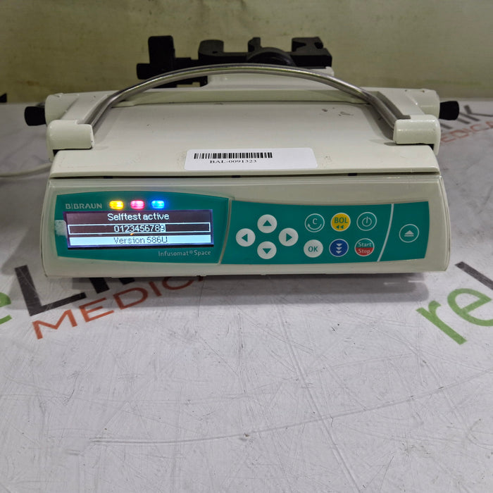 B. Braun Infusomat Space w/Pole Clamp & AC Adapter Infusion Pump