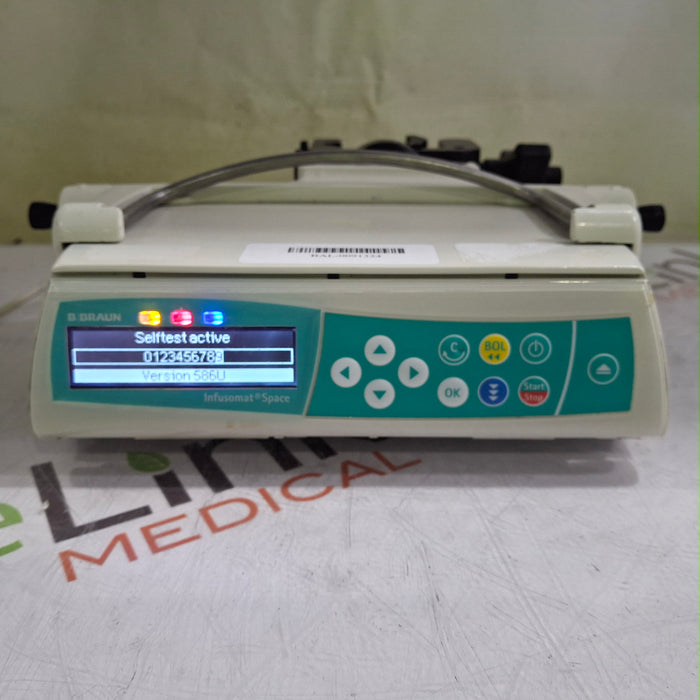 B. Braun Infusomat Space w/Pole Clamp & AC Adapter Infusion Pump