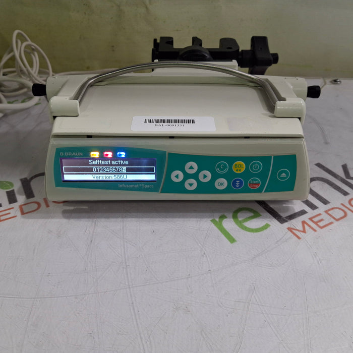 B. Braun Infusomat Space w/Pole Clamp & AC Adapter Infusion Pump