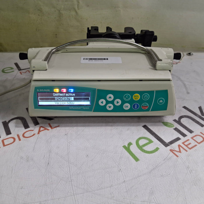 B. Braun Infusomat Space w/Pole Clamp & AC Adapter Infusion Pump