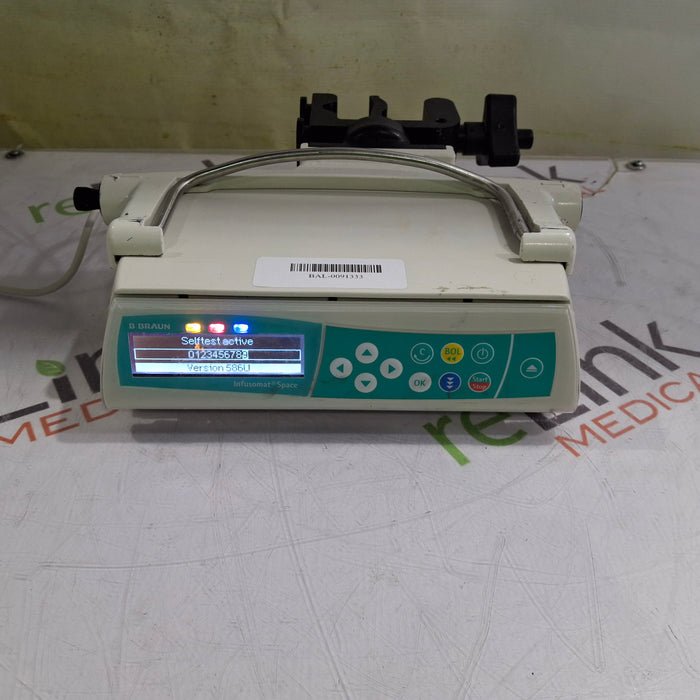 B. Braun Infusomat Space w/Pole Clamp & AC Adapter Infusion Pump