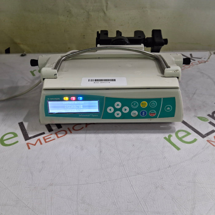 B. Braun Infusomat Space w/Pole Clamp & AC Adapter Infusion Pump