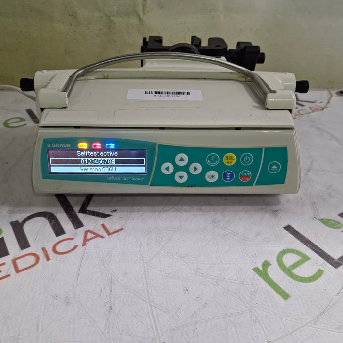 B. Braun Infusomat Space w/Pole Clamp & AC Adapter Infusion Pump