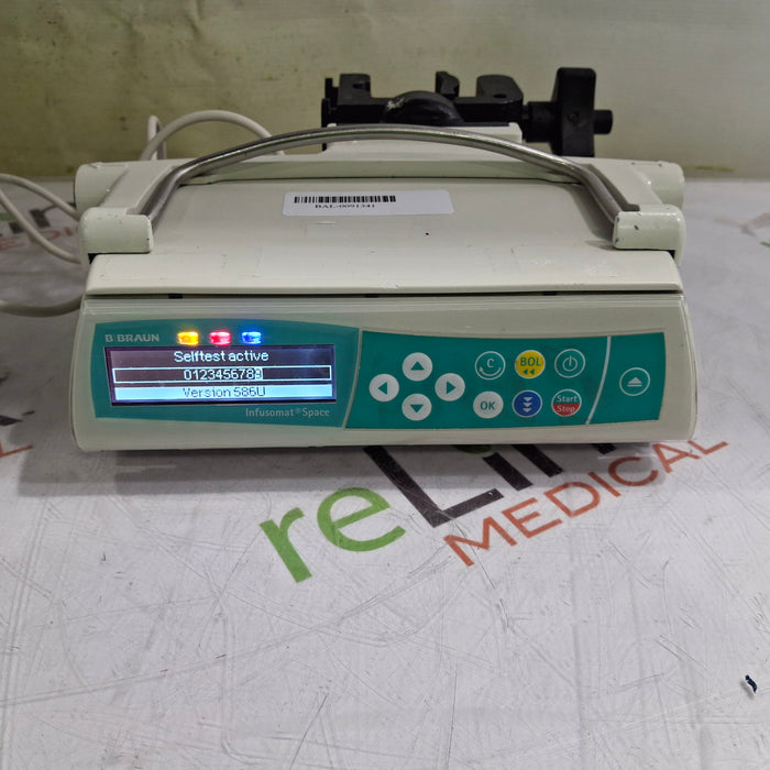 B. Braun Infusomat Space w/Pole Clamp & AC Adapter Infusion Pump