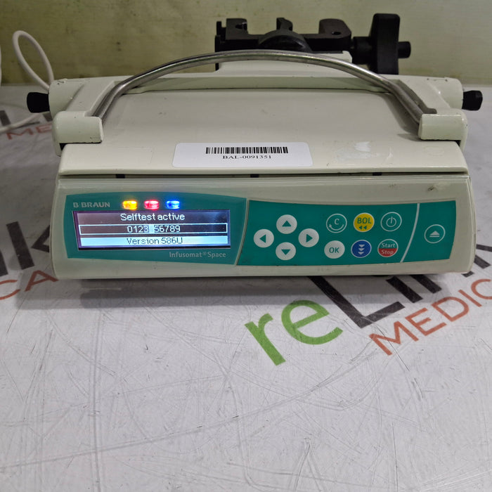 B. Braun Infusomat Space w/Pole Clamp & AC Adapter Infusion Pump