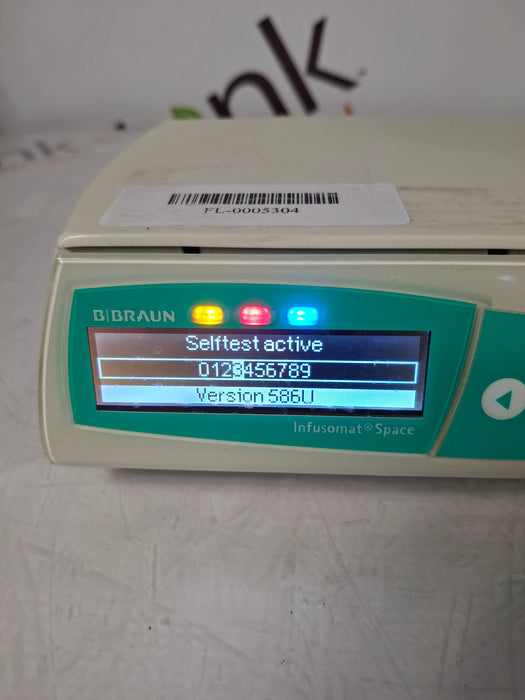 B. Braun Infusomat Space w/Pole Clamp & AC Adapter Infusion Pump