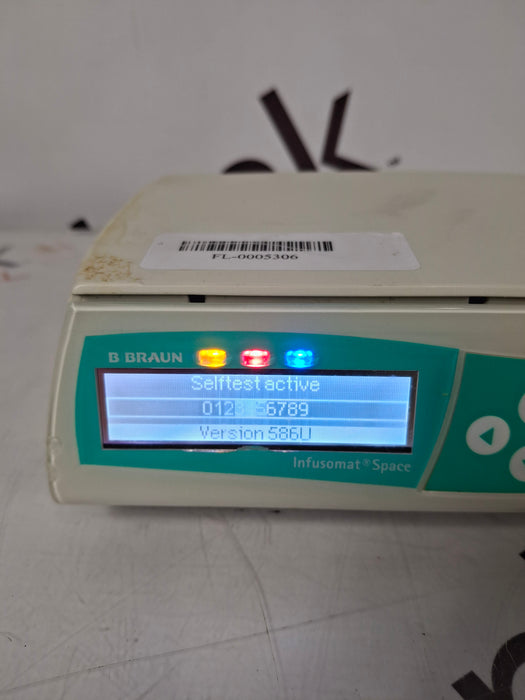 B. Braun Infusomat Space w/Pole Clamp & AC Adapter Infusion Pump