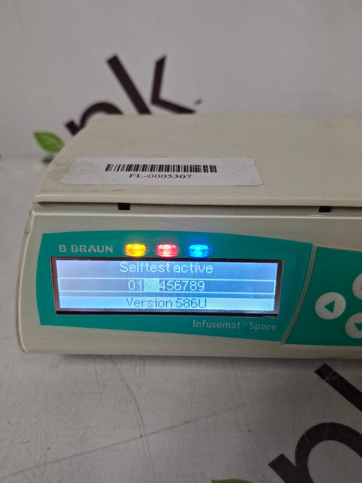 B. Braun Infusomat Space w/Pole Clamp & AC Adapter Infusion Pump