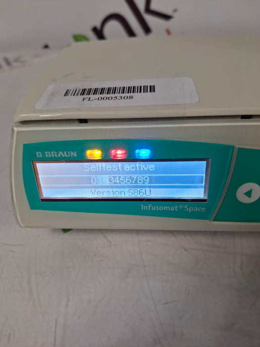 B. Braun Infusomat Space w/Pole Clamp & AC Adapter Infusion Pump