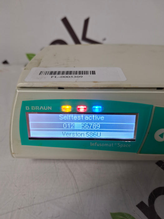B. Braun Infusomat Space w/Pole Clamp & AC Adapter Infusion Pump