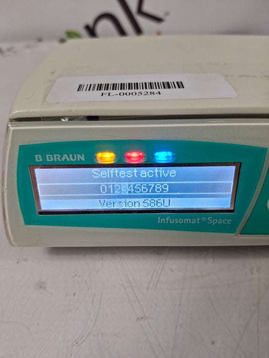 B. Braun Infusomat Space w/Pole Clamp & AC Adapter Infusion Pump