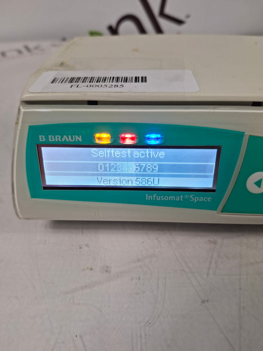B. Braun Infusomat Space w/Pole Clamp & AC Adapter Infusion Pump