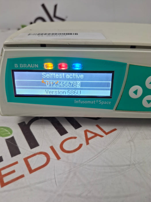 B. Braun Infusomat Space w/Pole Clamp & AC Adapter Infusion Pump