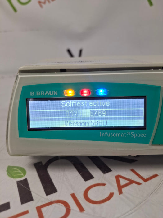 B. Braun Infusomat Space w/Pole Clamp & AC Adapter Infusion Pump
