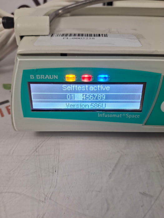 B. Braun Infusomat Space w/Pole Clamp & AC Adapter Infusion Pump