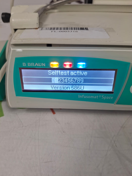 B. Braun Infusomat Space w/Pole Clamp & AC Adapter Infusion Pump