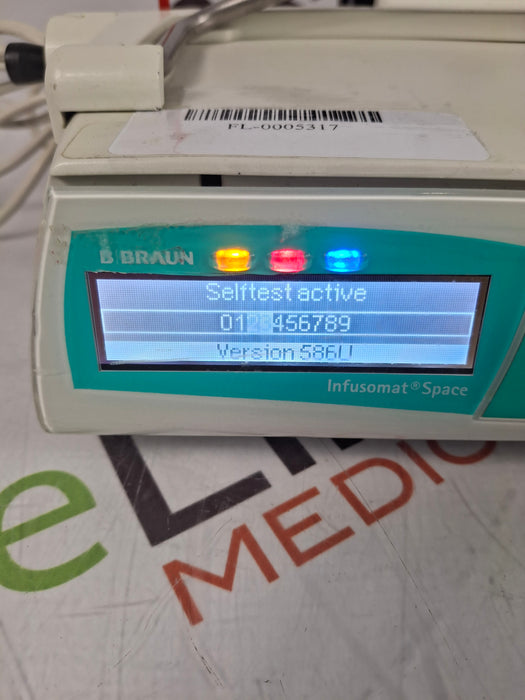B. Braun Infusomat Space w/Pole Clamp & AC Adapter Infusion Pump
