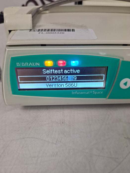 B. Braun Infusomat Space w/Pole Clamp & AC Adapter Infusion Pump