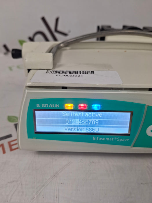 B. Braun Infusomat Space w/Pole Clamp & AC Adapter Infusion Pump