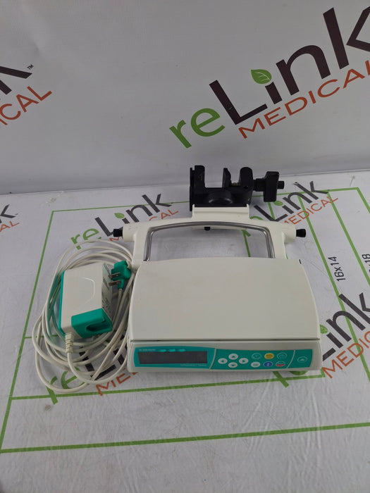B. Braun Infusomat Space w/Pole Clamp & AC Adapter Infusion Pump