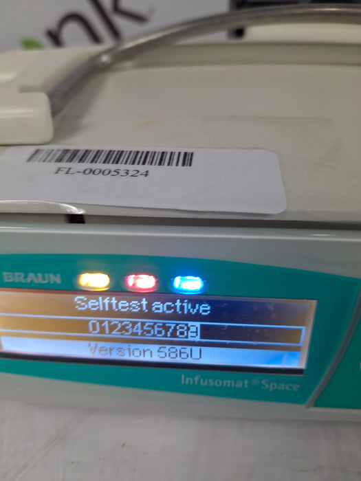 B. Braun Infusomat Space w/Pole Clamp & AC Adapter Infusion Pump