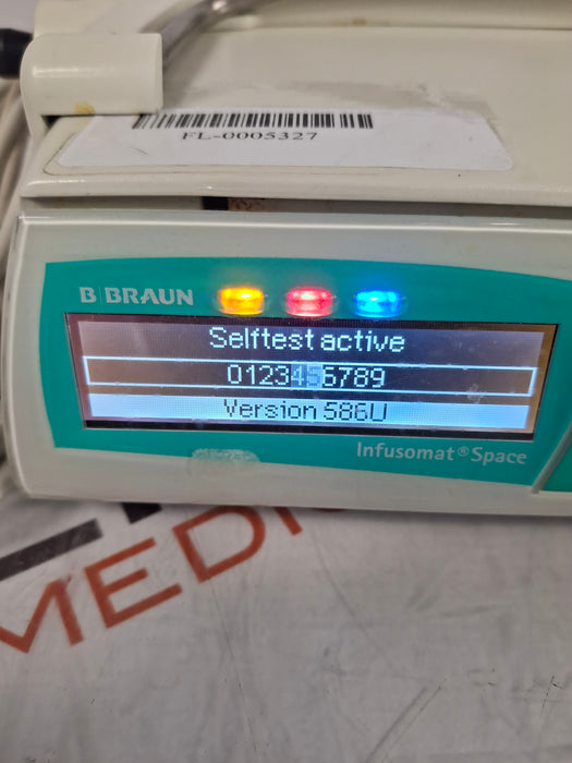 B. Braun Infusomat Space w/Pole Clamp & AC Adapter Infusion Pump