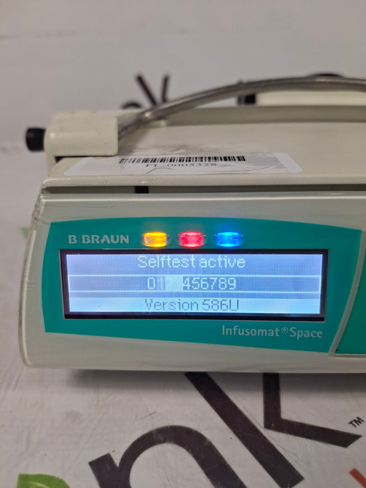 B. Braun Infusomat Space w/Pole Clamp & AC Adapter Infusion Pump