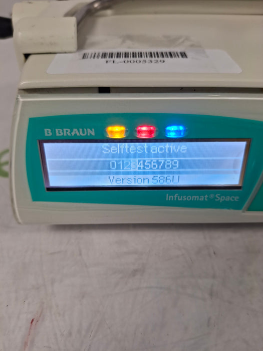 B. Braun Infusomat Space w/Pole Clamp & AC Adapter Infusion Pump