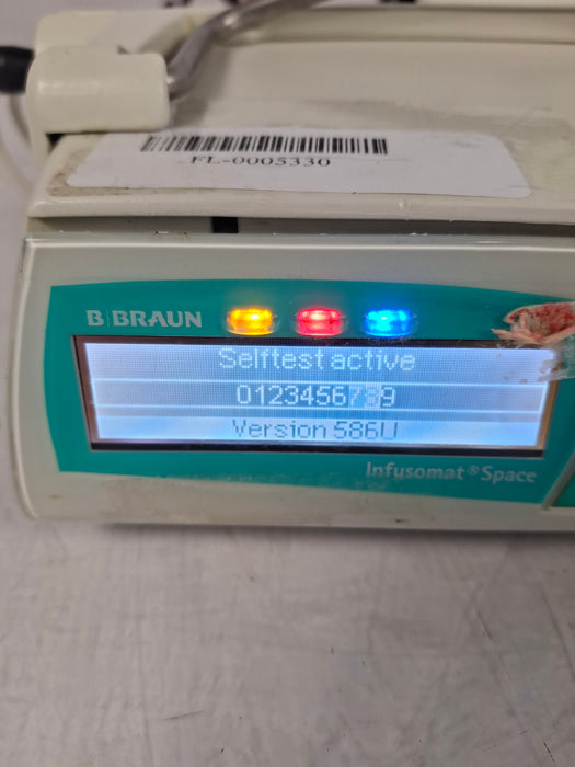 B. Braun Infusomat Space w/Pole Clamp & AC Adapter Infusion Pump