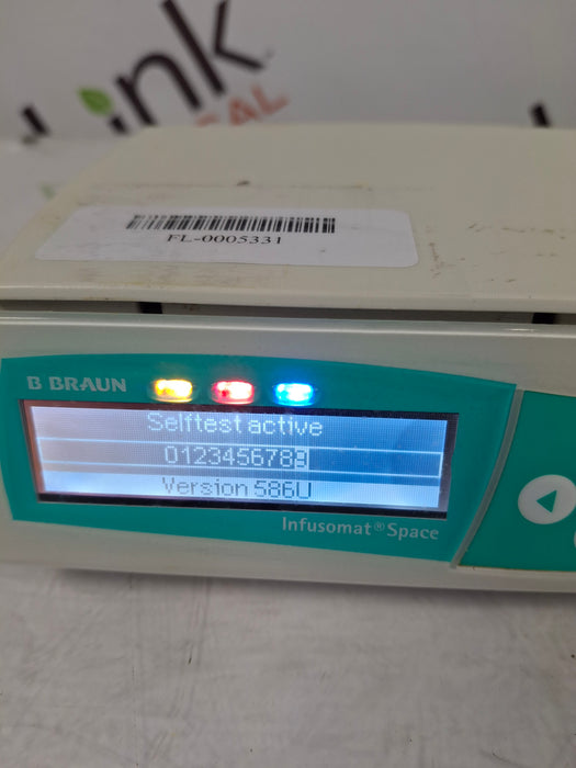 B. Braun Infusomat Space w/Pole Clamp & AC Adapter Infusion Pump