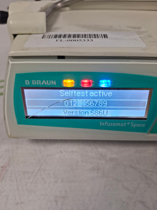 B. Braun Infusomat Space w/Pole Clamp & AC Adapter Infusion Pump