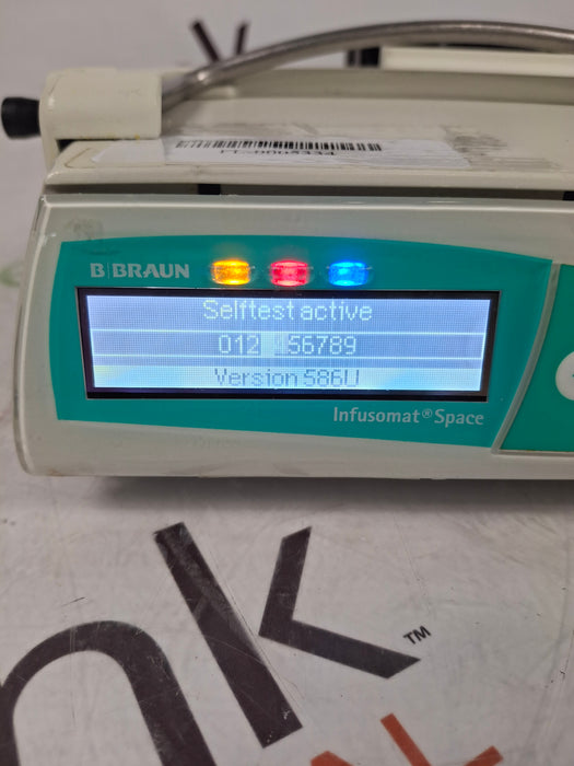 B. Braun Infusomat Space w/Pole Clamp & AC Adapter Infusion Pump