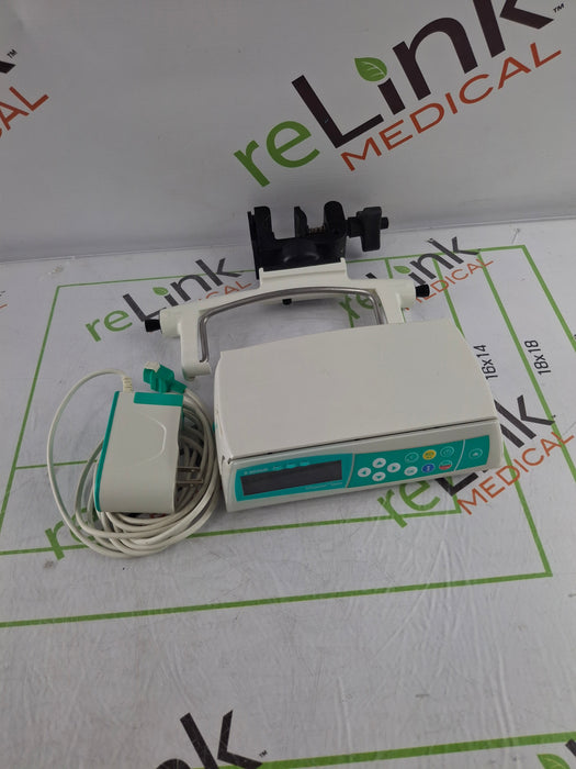 B. Braun Infusomat Space w/Pole Clamp & AC Adapter Infusion Pump