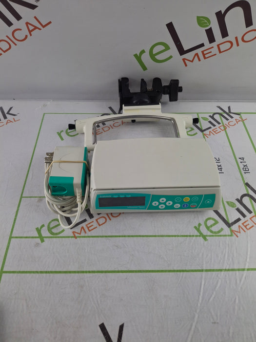 B. Braun Infusomat Space w/Pole Clamp & AC Adapter Infusion Pump