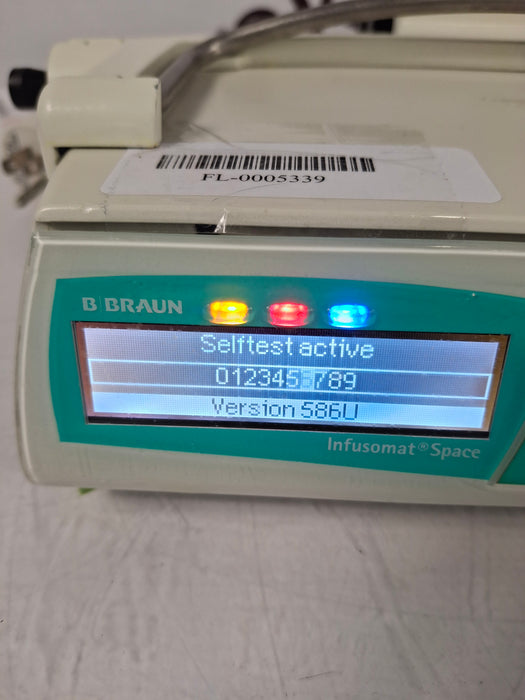 B. Braun Infusomat Space w/Pole Clamp & AC Adapter Infusion Pump