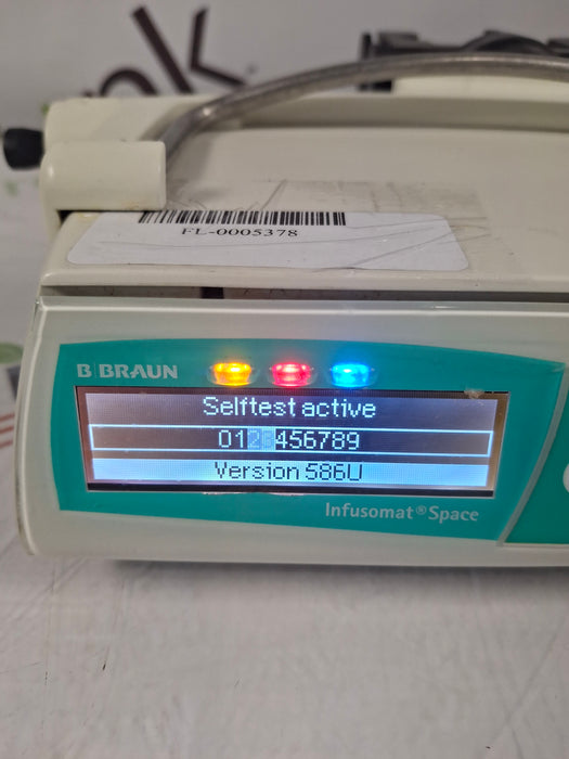 B. Braun Infusomat Space w/Pole Clamp & AC Adapter Infusion Pump