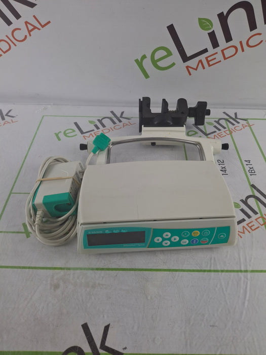 B. Braun Infusomat Space w/Pole Clamp & AC Adapter Infusion Pump