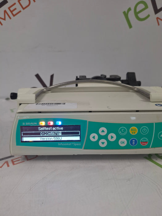 B. Braun Infusomat Space w/Pole Clamp & AC Adapter Infusion Pump