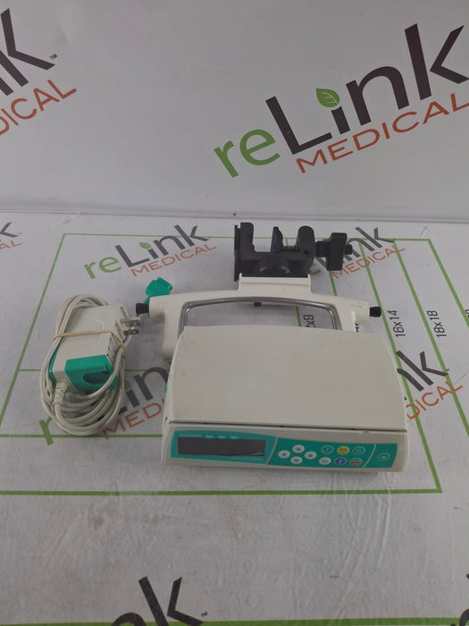 B. Braun Infusomat Space w/Pole Clamp & AC Adapter Infusion Pump