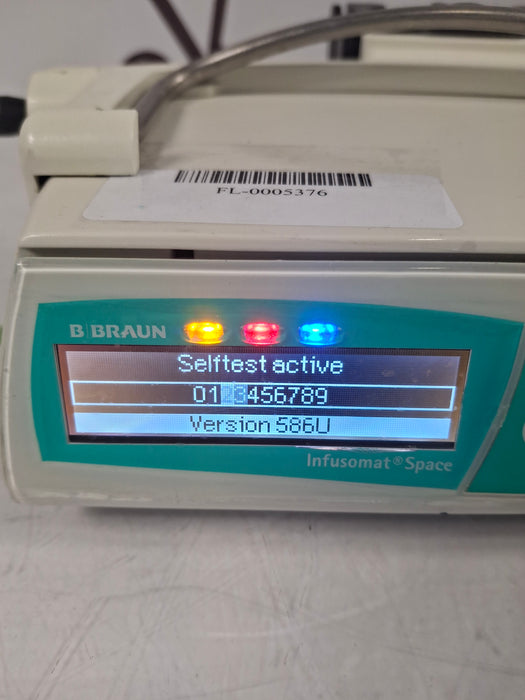 B. Braun Infusomat Space w/Pole Clamp & AC Adapter Infusion Pump