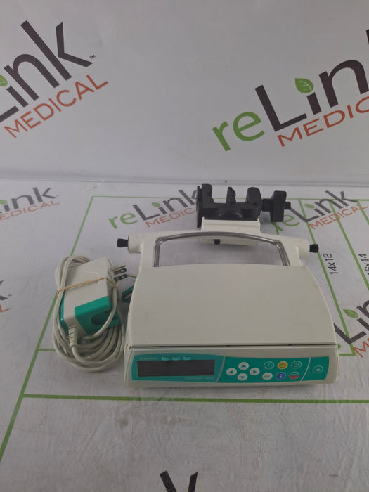 B. Braun Infusomat Space w/Pole Clamp & AC Adapter Infusion Pump