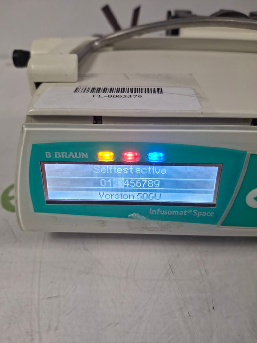 B. Braun Infusomat Space w/Pole Clamp & AC Adapter Infusion Pump