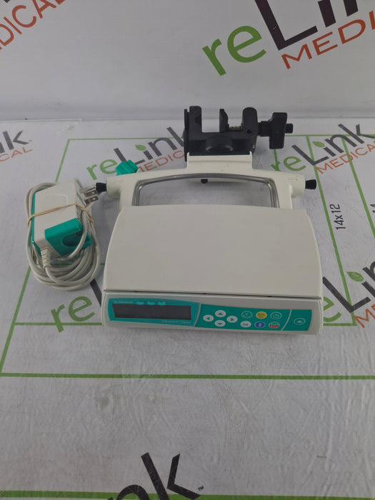 B. Braun Infusomat Space w/Pole Clamp & AC Adapter Infusion Pump