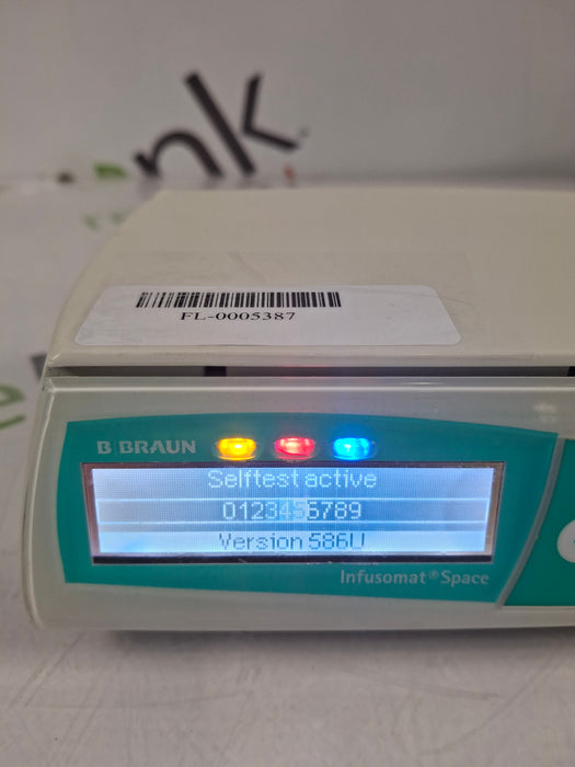 B. Braun Infusomat Space w/Pole Clamp & AC Adapter Infusion Pump