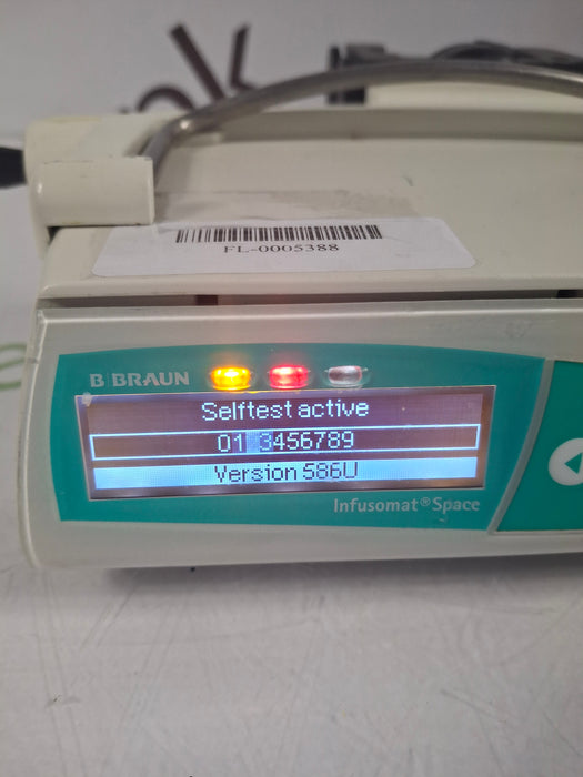 B. Braun Infusomat Space w/Pole Clamp & AC Adapter Infusion Pump