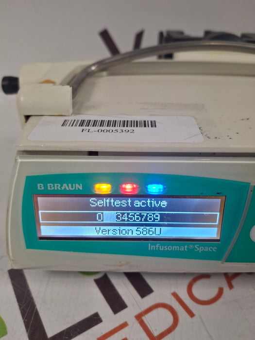 B. Braun Infusomat Space w/Pole Clamp & AC Adapter Infusion Pump