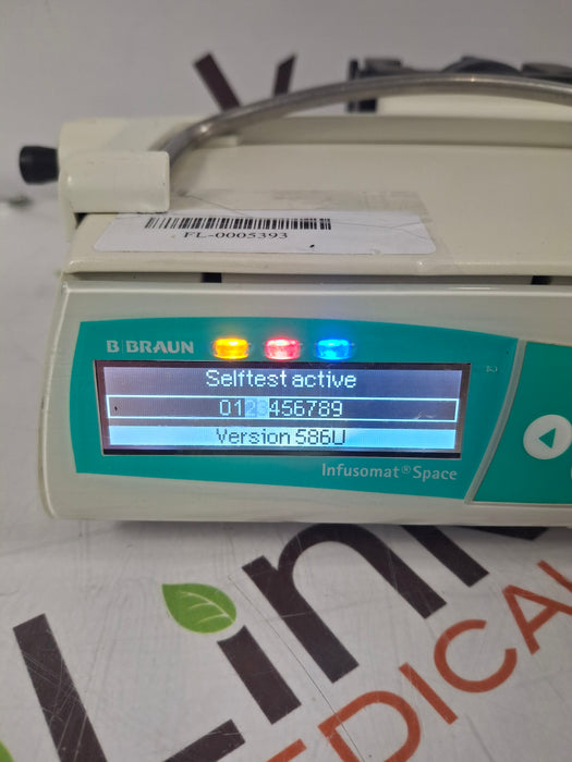 B. Braun Infusomat Space w/Pole Clamp & AC Adapter Infusion Pump